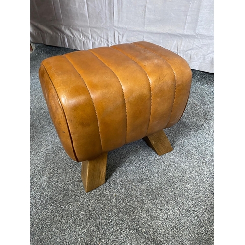 380A - Tan leather upholstered footstool. {35 cm H x 40 cm H x 29 cm D}.