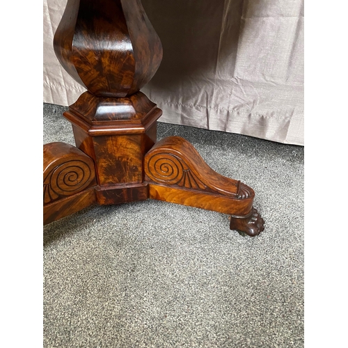 398A - William IV marble topped mahogany table on three outswept lion's paw feet. {72 cm H x 82 cm Dia.}.