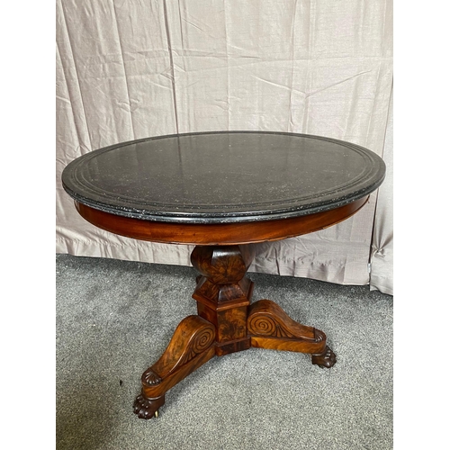 398A - William IV marble topped mahogany table on three outswept lion's paw feet. {72 cm H x 82 cm Dia.}.