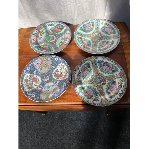 637A - Four Oriental plates with various designs. {26 cm Dia.}