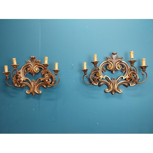 658A - Pair of good quality giltwood wall lights with scroll decoration. {41 cm H x 59 cm W x 11 cm D}.