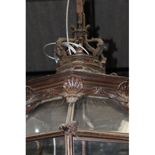 165A - Decorative walnut glazed hanging lantern in the French style. {187 cm H x 80 cm Diam}.