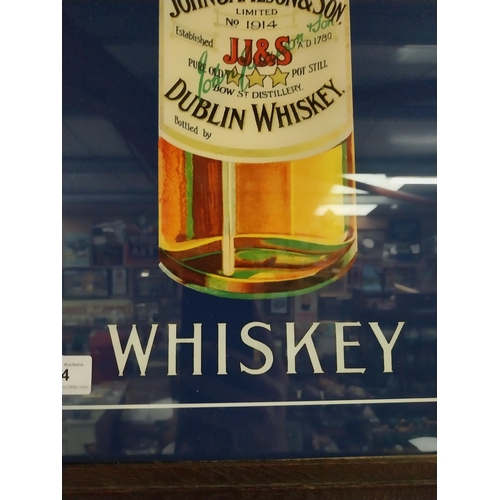 24 - John Jameson's Whiskey print in stamped oak frame. {74 cm H x 49 cm W}.