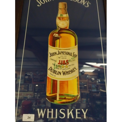 24 - John Jameson's Whiskey print in stamped oak frame. {74 cm H x 49 cm W}.