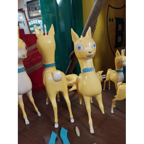 3 - Collection of seven 1960's Perspex Babycham advertising deer's some with damage. {18 cm H}