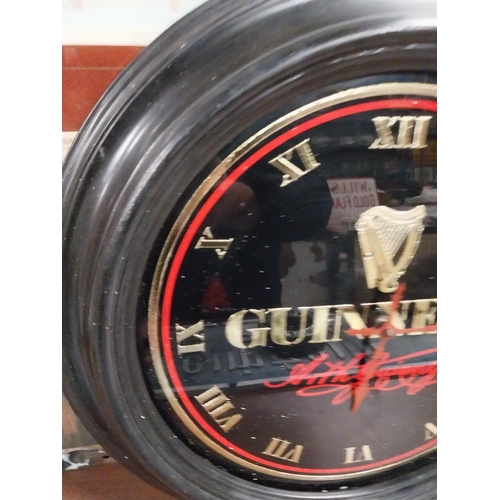 39 - Guinness advertising clock. {22 cm W}.