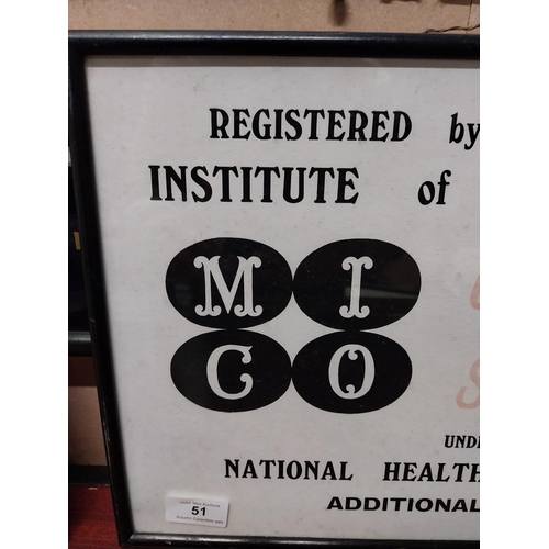 51 - Institute of Chemists/Opticians NHS framed showcard. {29 cm H x 35 cm W}.