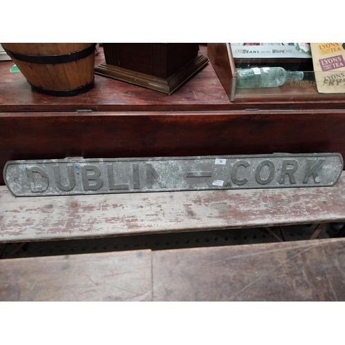 55 - 1960's alloy carriage destination plate Dublin - Cork. {13 cm H x 118 cm W}.