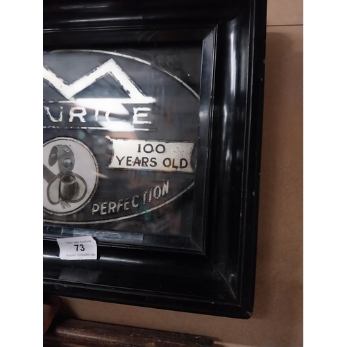 73 - Maurice Pipe Tobacco framed advertisement on reverse painted glass. {28 cm H x 27 cm W}.