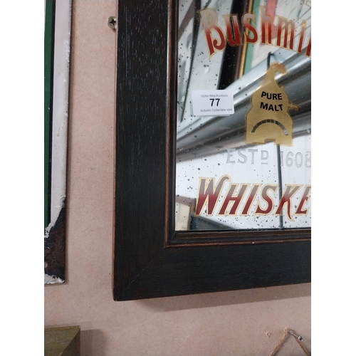 77 - Framed Bushmills Irish Whiskey advertising mirror. {34 cm H x 39 cm W}.