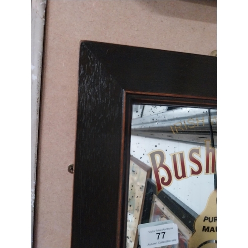 77 - Framed Bushmills Irish Whiskey advertising mirror. {34 cm H x 39 cm W}.