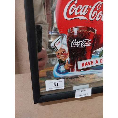 81 - Coca Cola framed advertising mirror. {23 cm H x 22 cm W}.