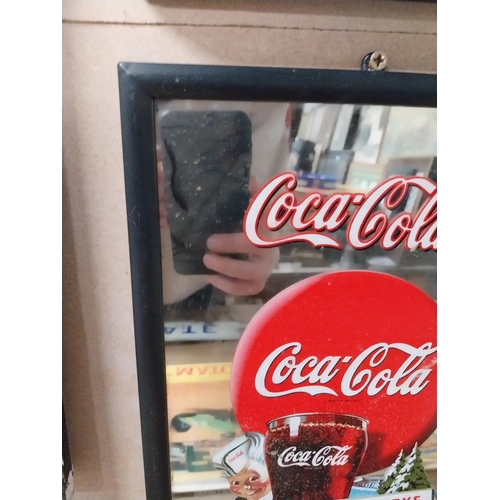 81 - Coca Cola framed advertising mirror. {23 cm H x 22 cm W}.