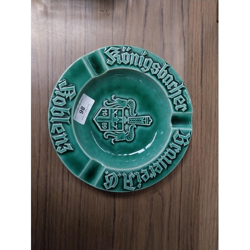 86 - German ceramic advertising ashtray. {3 cm H x 19 cm Dia.} and Superkings Cigarettes plastic ashtray.... 