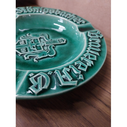 86 - German ceramic advertising ashtray. {3 cm H x 19 cm Dia.} and Superkings Cigarettes plastic ashtray.... 