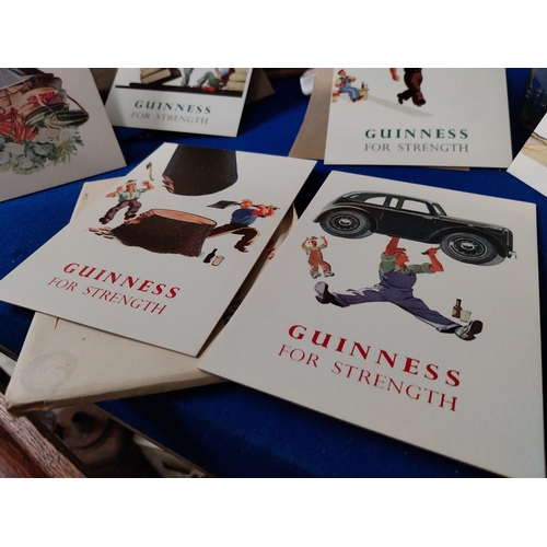 804 - Set of original Guinness postcards. {11 cm H x 15 cm W}.