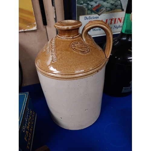 807 - Kelly Brothers Wine Merchants Dublin stoneware flagon. {31 cm H x 18 cm Dia.}.