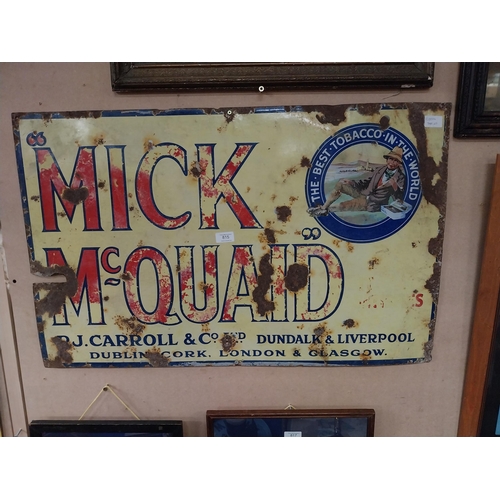 815 - Mick McQuaid P J Carroll and Co enamel advertising sign. {65 cm H x 85 cm D}.