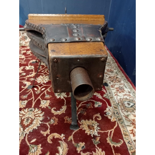 133 - Coffee table in the form of a 19th C. blacksmiths bellows  {H 50cm x W 145cm x D 86cm }.