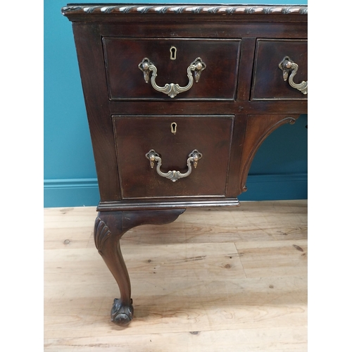 137 - Edwardian mahogany desk with inset leather top and brass handles raised on cabriole legs and ball an... 