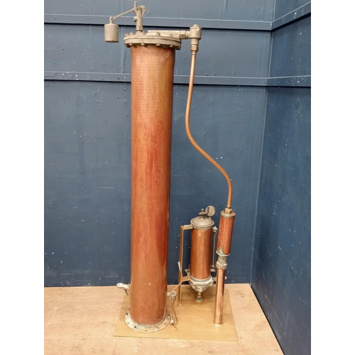 139 - 19th C. brass and metal distillery pump. {H 200cm x W 80cm x D 58cm}.