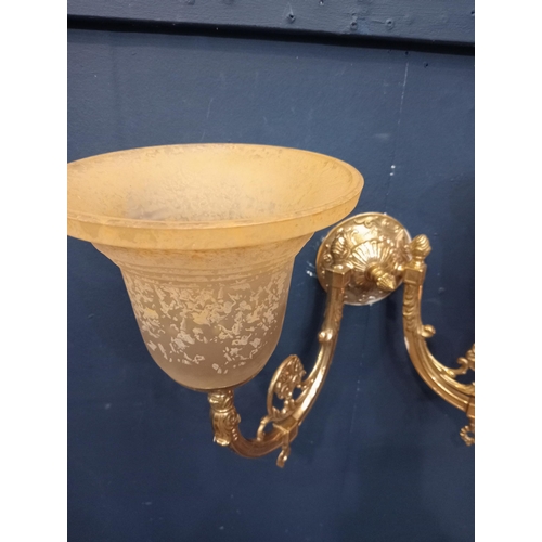 146 - 20th C. Double brass wall light with amber shade. {H 30cm x W 47cm x D 20cm }.