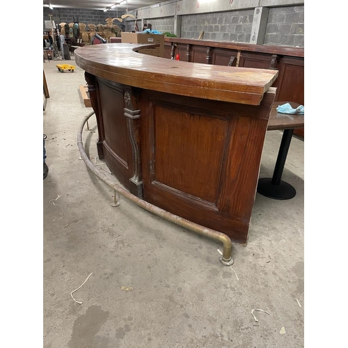 164 - Mahogany curved bar front with brass foot rail {135cm x 400cm} (not available to view in person).