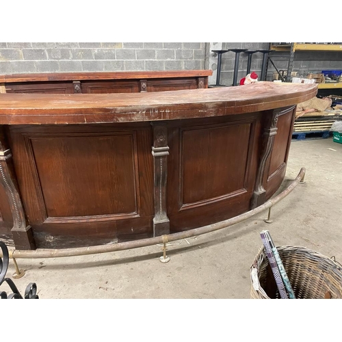 164 - Mahogany curved bar front with brass foot rail {135cm x 400cm} (not available to view in person).