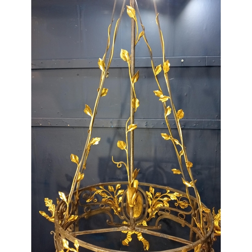 173 - Decorative gilded brass chandelier. {H 126cm x W90vm x D 46cm }.