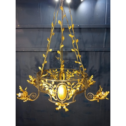 173 - Decorative gilded brass chandelier. {H 126cm x W90vm x D 46cm }.