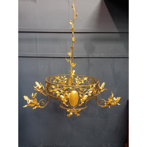 173 - Decorative gilded brass chandelier. {H 126cm x W90vm x D 46cm }.