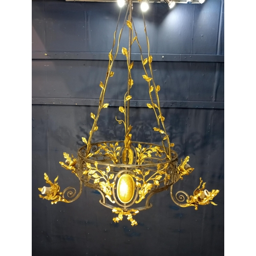 173 - Decorative gilded brass chandelier. {H 126cm x W90vm x D 46cm }.