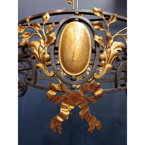 173 - Decorative gilded brass chandelier. {H 126cm x W90vm x D 46cm }.