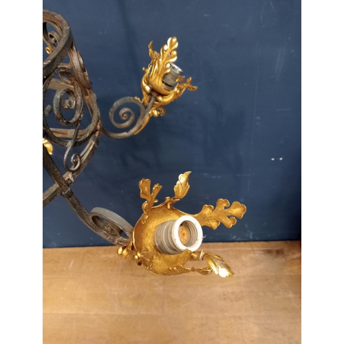 173 - Decorative gilded brass chandelier. {H 126cm x W90vm x D 46cm }.