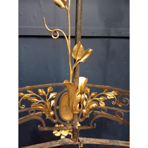 173 - Decorative gilded brass chandelier. {H 126cm x W90vm x D 46cm }.