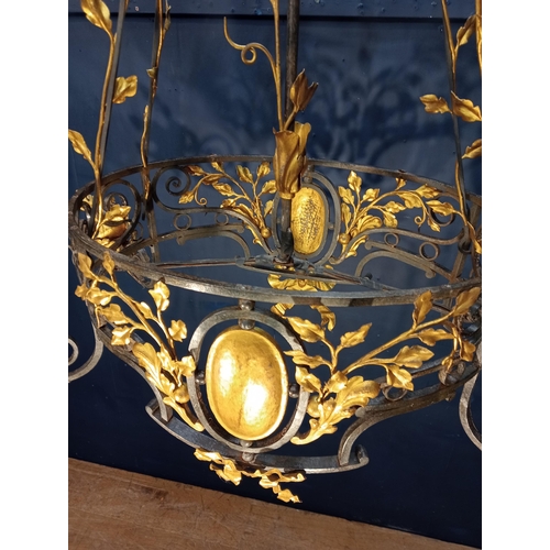 173 - Decorative gilded brass chandelier. {H 126cm x W90vm x D 46cm }.