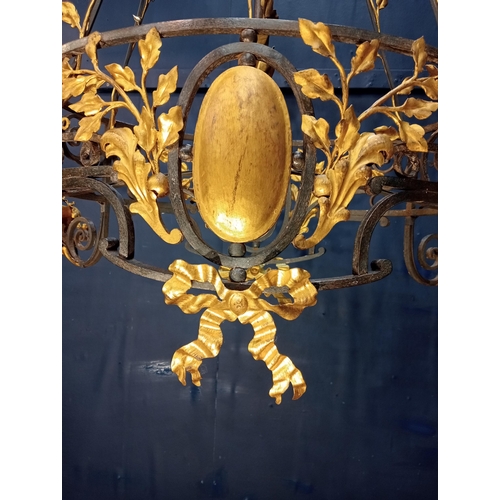 173 - Decorative gilded brass chandelier. {H 126cm x W90vm x D 46cm }.