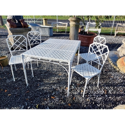 180 - Good quality cast aluminium bamboo style garden table with four chairs. Table {70 cm H x 129 cm W x ... 