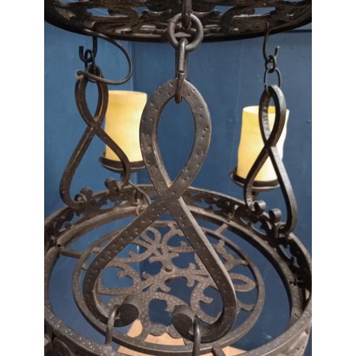 201 - Wrought iron nine branch chandelier with opaque glass shades in the Gothic style. {H 100cm x Dia 80c... 