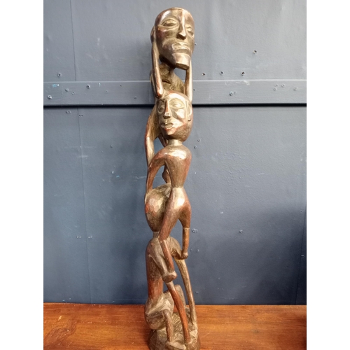 211 - carved wooden totem sculpture. {H 70cm x W 14cm x D 14cm }.