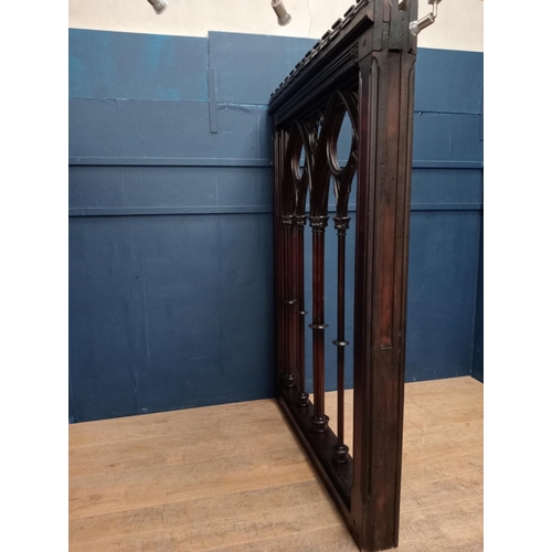 241 - Carved oak divider in the Gothic style. {H 240cm x W 18cm x D 174cm}.