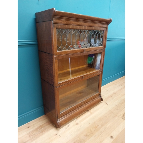 247 - 1940s oak stacking bookcase by Gunn sectional bookcases {127 cm H x 87 cm W x 36 cm D}.