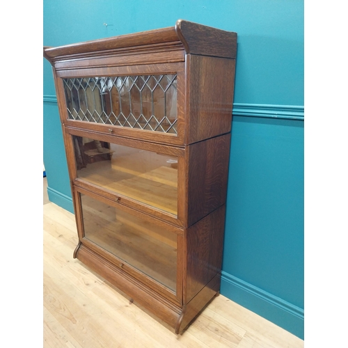 247 - 1940s oak stacking bookcase by Gunn sectional bookcases {127 cm H x 87 cm W x 36 cm D}.