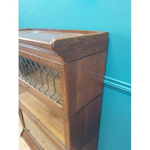 247 - 1940s oak stacking bookcase by Gunn sectional bookcases {127 cm H x 87 cm W x 36 cm D}.