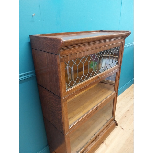 247 - 1940s oak stacking bookcase by Gunn sectional bookcases {127 cm H x 87 cm W x 36 cm D}.