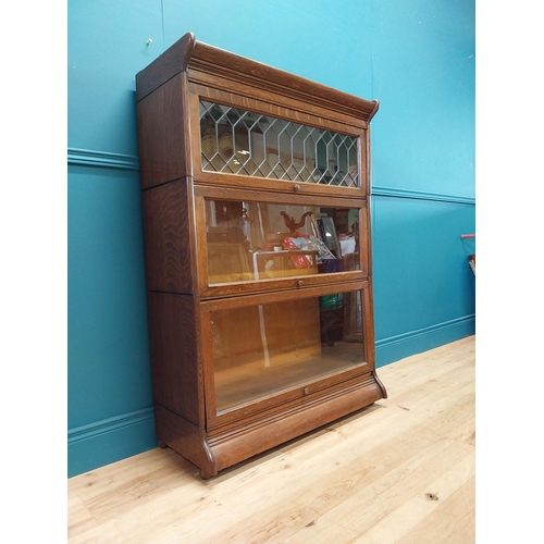 247 - 1940s oak stacking bookcase by Gunn sectional bookcases {127 cm H x 87 cm W x 36 cm D}.