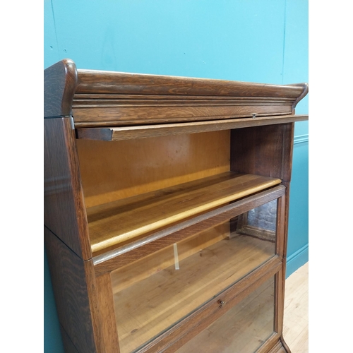 247 - 1940s oak stacking bookcase by Gunn sectional bookcases {127 cm H x 87 cm W x 36 cm D}.