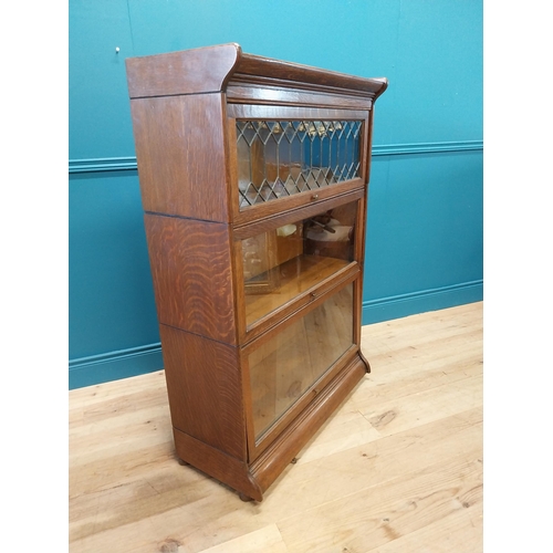 247 - 1940s oak stacking bookcase by Gunn sectional bookcases {127 cm H x 87 cm W x 36 cm D}.