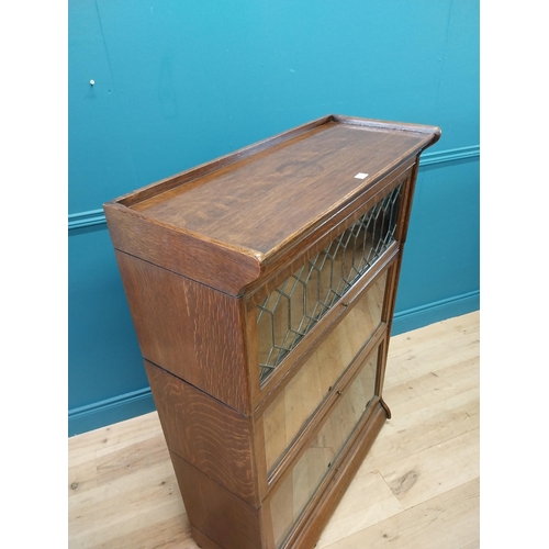 247 - 1940s oak stacking bookcase by Gunn sectional bookcases {127 cm H x 87 cm W x 36 cm D}.