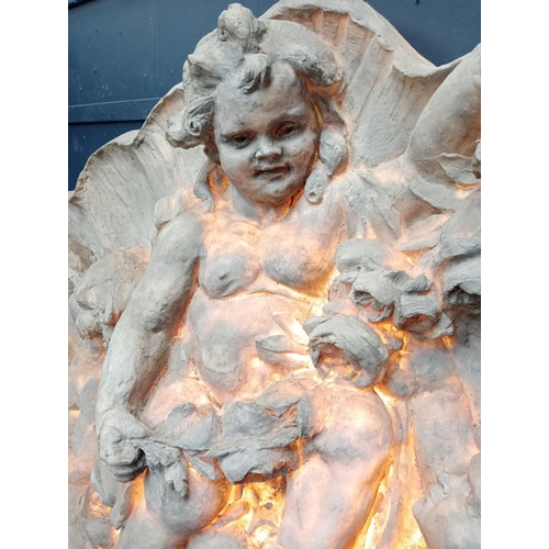 249 - Large ornate wall mounted fibreglass plaque depicting musical cherubs. {H150cm x W 232cm x D 36cm }.